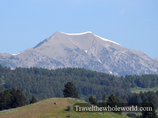 Snow in July Snow-covered mountain in Montana during July