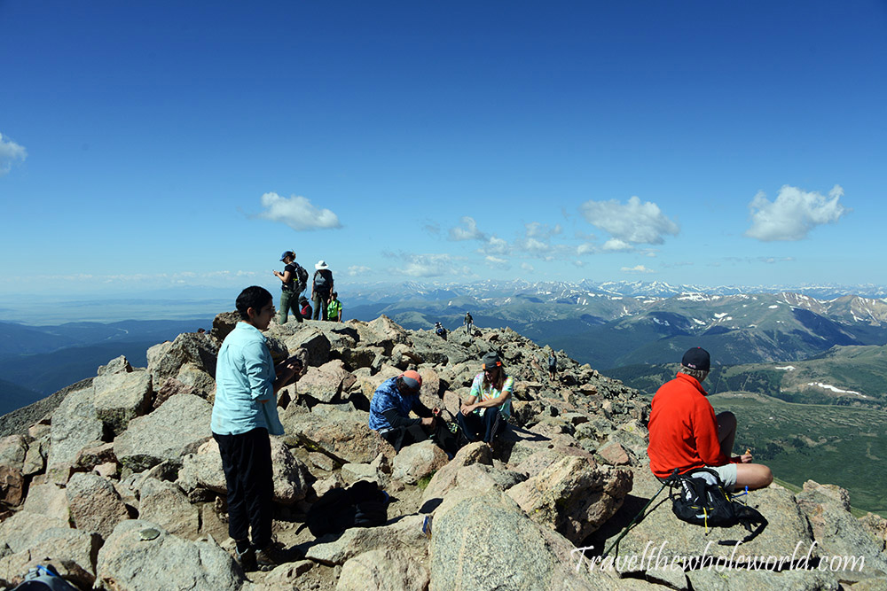 Climbers on the summit of Mt. Bierstadt