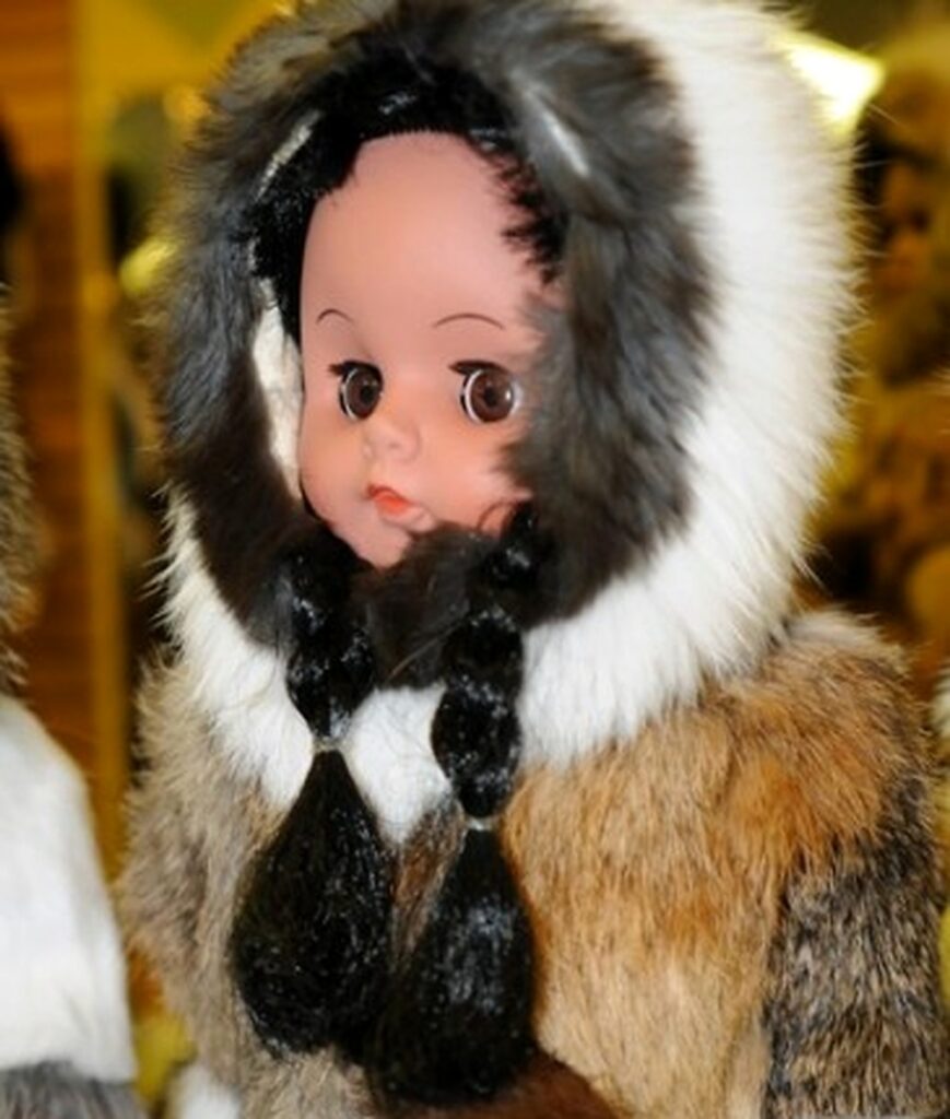 Traditional Alaska Native cold weather clothing displayed on a doll