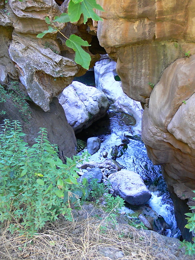 Looking down into the Vorotan River canyon from a natural bridge in Armenia