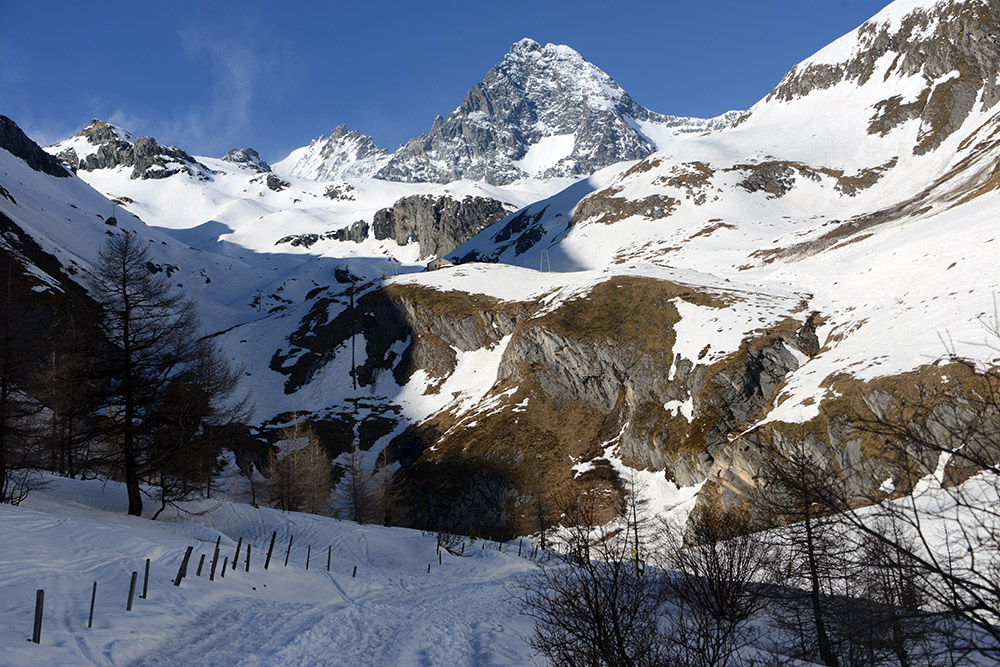 Grossglockner rising above the snowy valley at the beginning of the climb