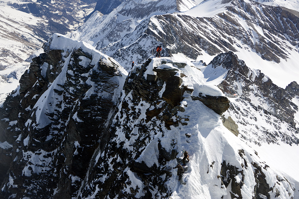 Climbers descending through the Glocknerscharte on Grossglockner