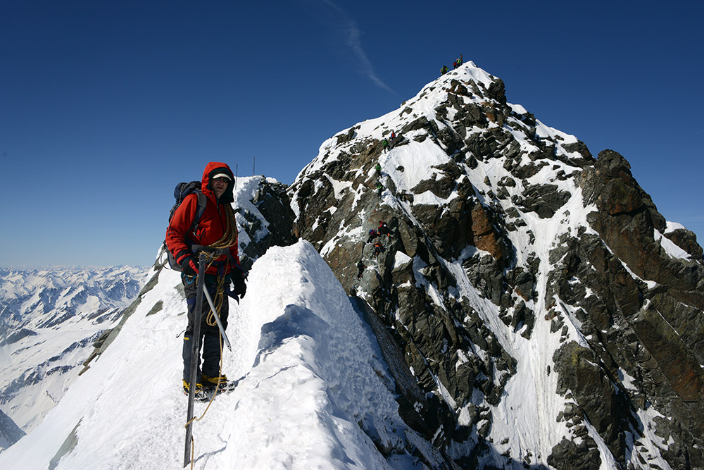 Narrow exposed summit ridge on Grossglockner in Austria
