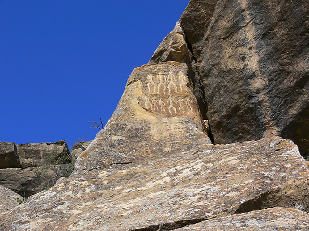 Ancient petroglyph carved into rock at Gobustan in Azerbaijan