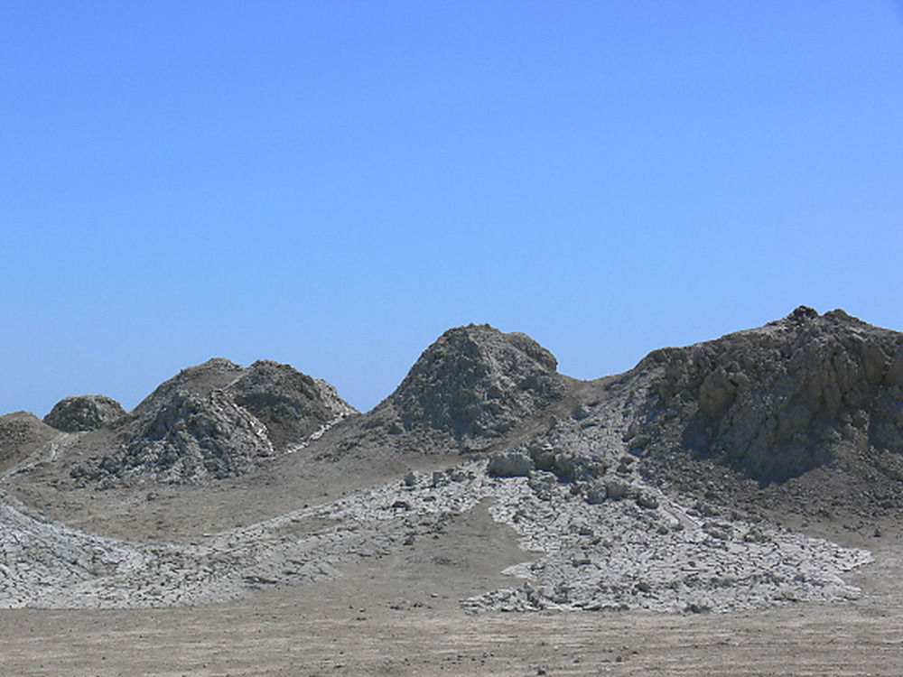Small mud volcanoes bubbling near Gobustan in Azerbaijan