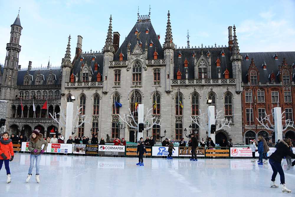 Ice skating in front of the Provinciaal Hof in Bruges