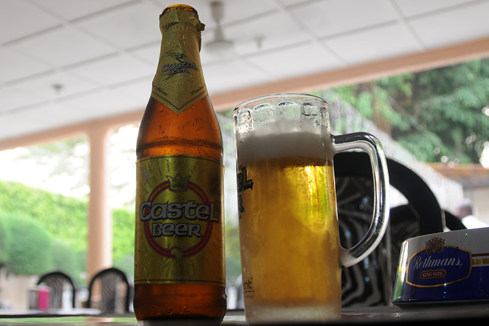 Beer advertisement along a street in Cotonou, Benin