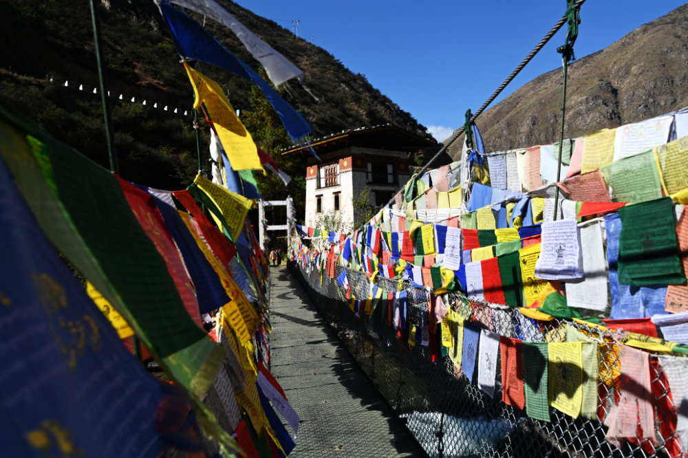 Traditional iron suspension bridge near Punakha, Bhutan