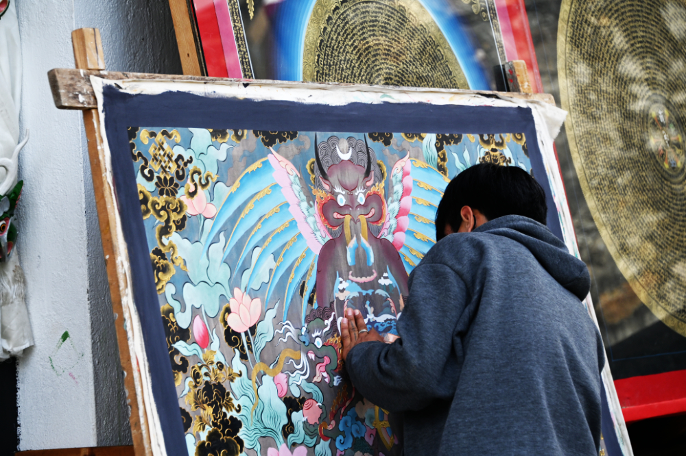Bhutanese Buddhist religious painter working in Punakha