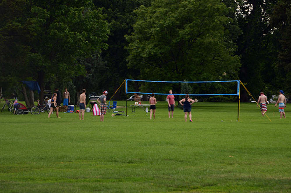 People playing volleyball in Denver City Park