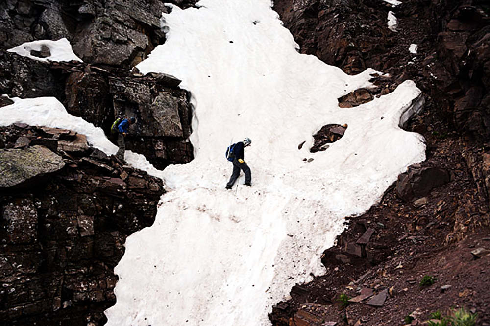 Steep snow crossing on Pyramid Peak