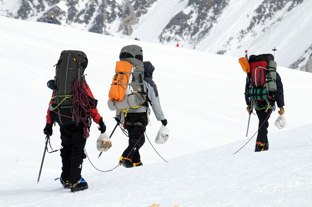 Carrying waste down from Denali High Camp