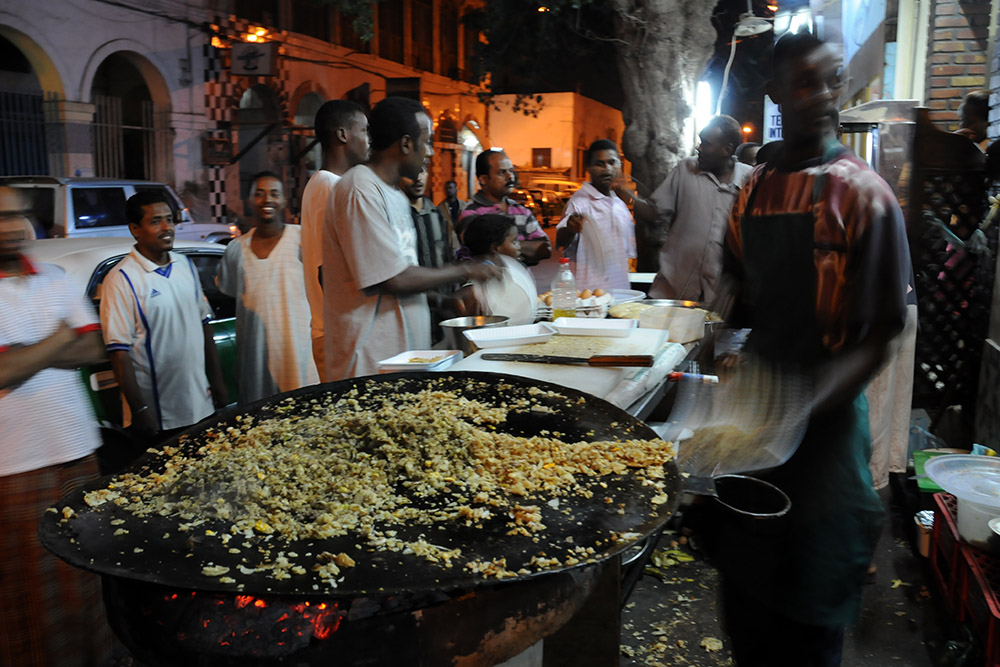 Food vendor cooking in Djibouti City