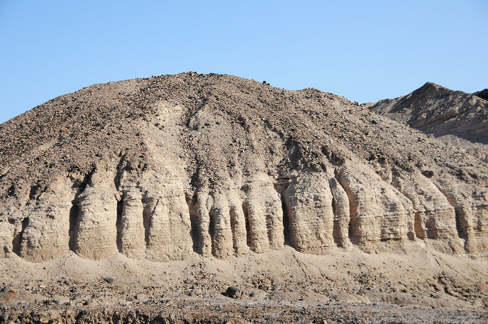 Brown and tan mountain beside Lake Assal in Djibouti