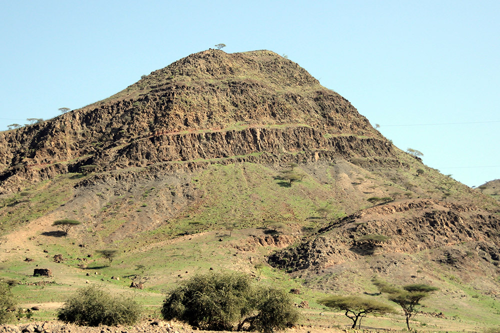 Dry mountain rising from the desert in Djibouti