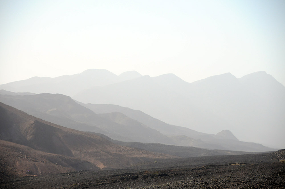 Dark mountains across the desert landscape of Djibouti