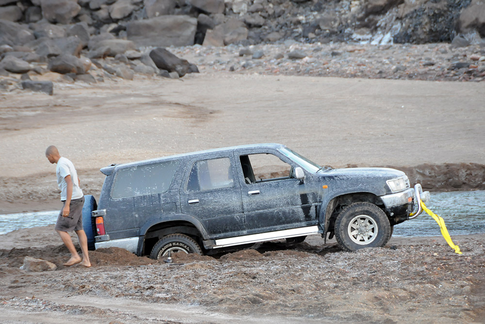 SUV stuck in a muddy riverbed in rural Djibouti