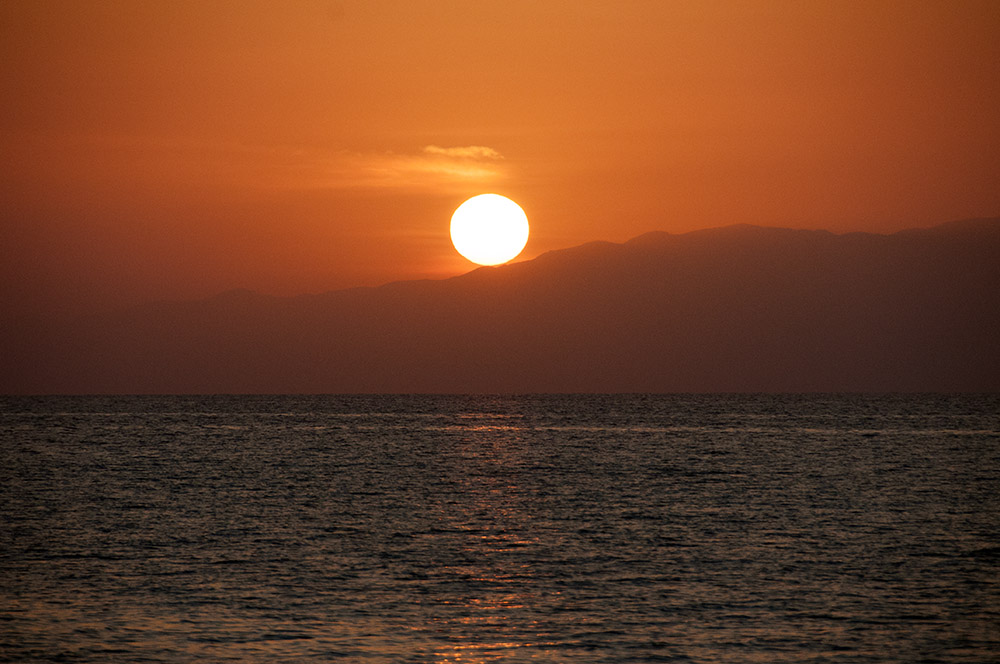 Sunset over the sea near the Moucha Islands