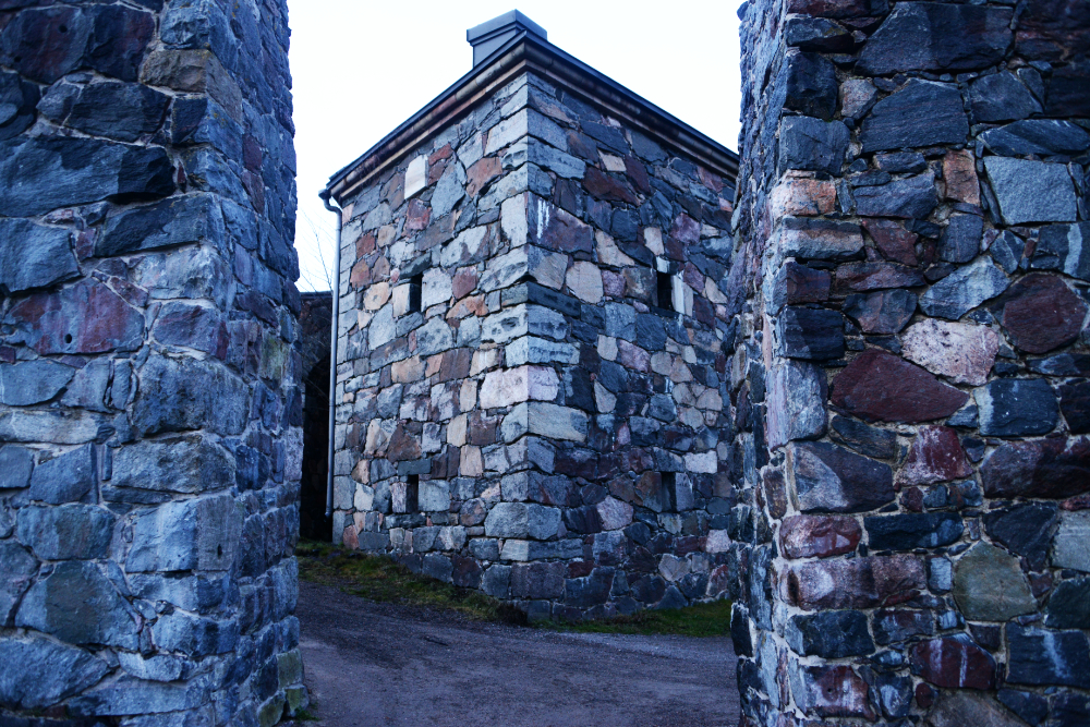 Stone buildings and defensive walls inside Suomenlinna Fortress