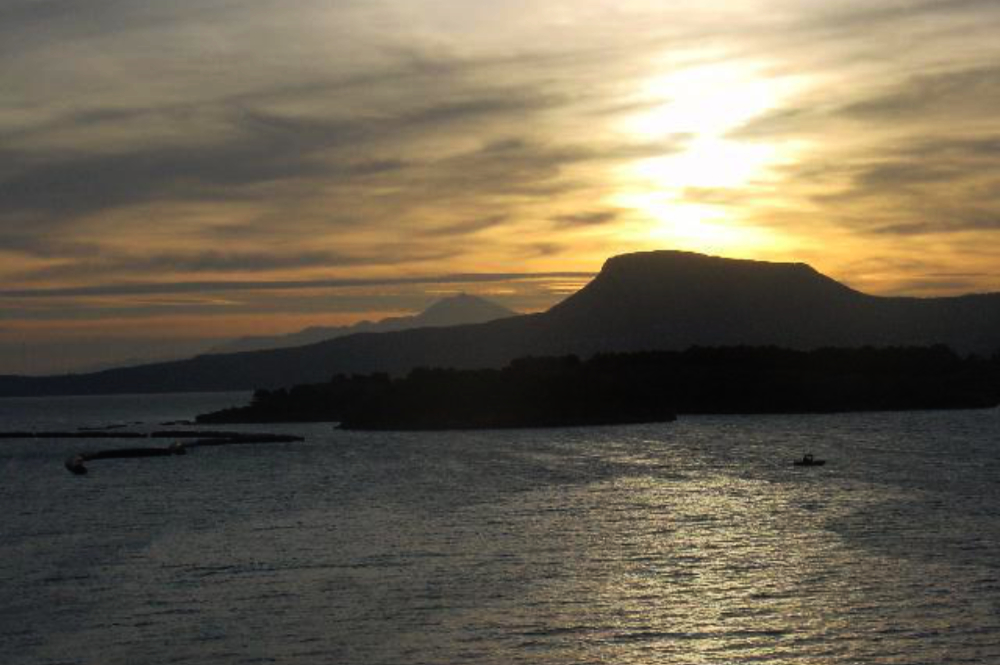 Sunset in Souda Bay Sunset viewed from an aircraft carrier in Souda Bay, Greece