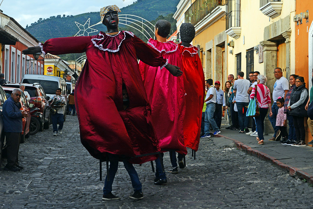 Traditional stilt dancers performing in Antigua, Guatemala