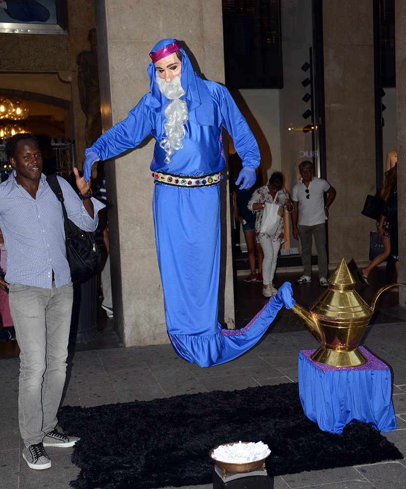 Street entertainer dressed as a genie in Milan