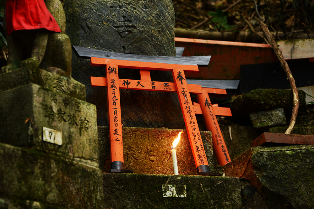 Candle at a religious site in Fushimi Inari Taisha