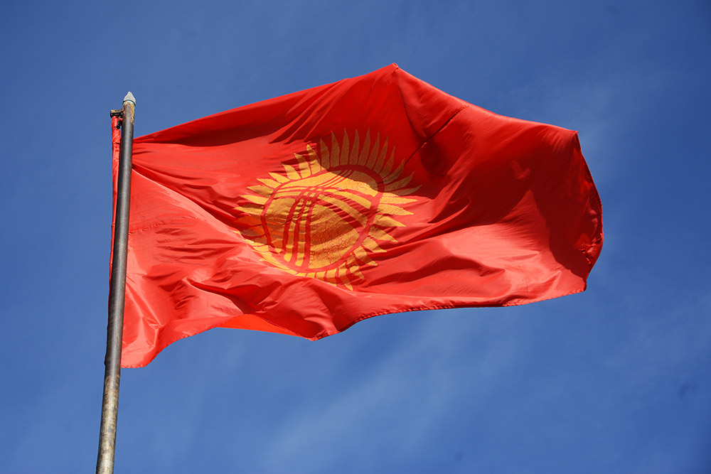 Flag of Kyrgyzstan above Osh