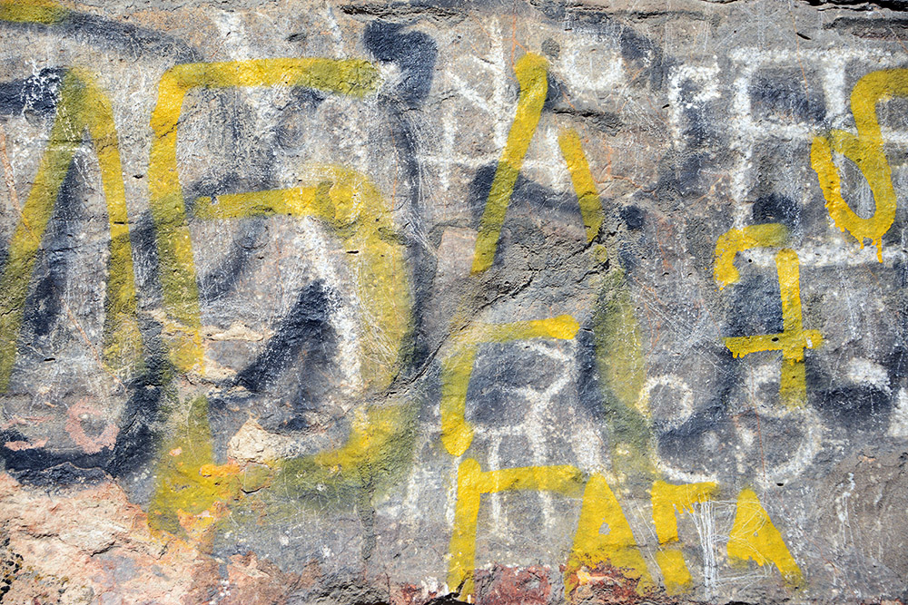Graffiti on Sulaiman-Too Sacred Mountain