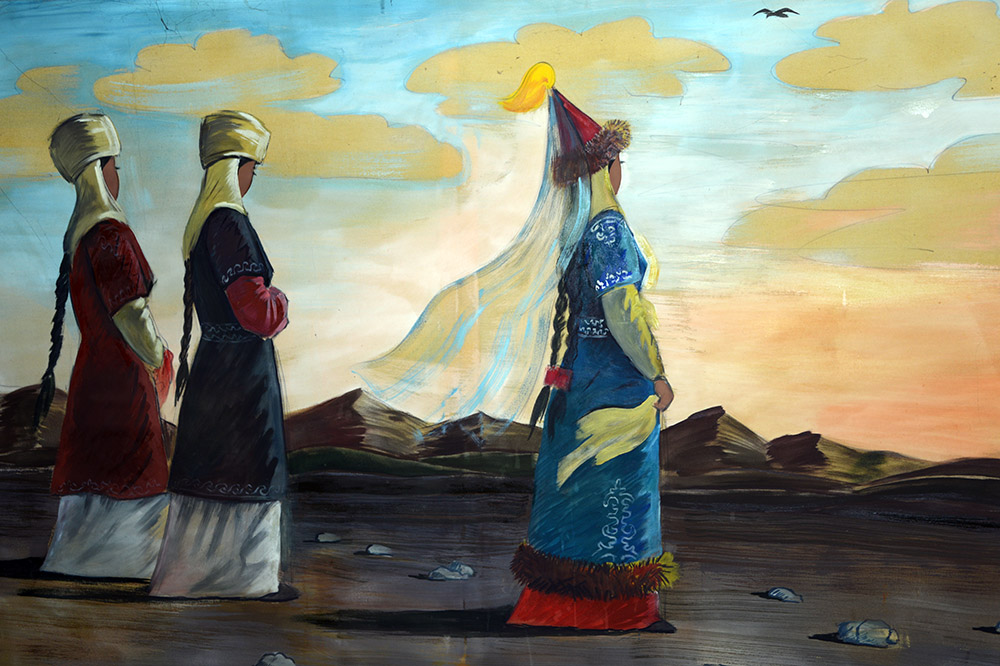 Kyrgyz people depicted inside the yurt museum