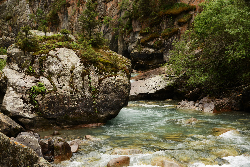 Creek and boulders in the Tian Shan Mountains