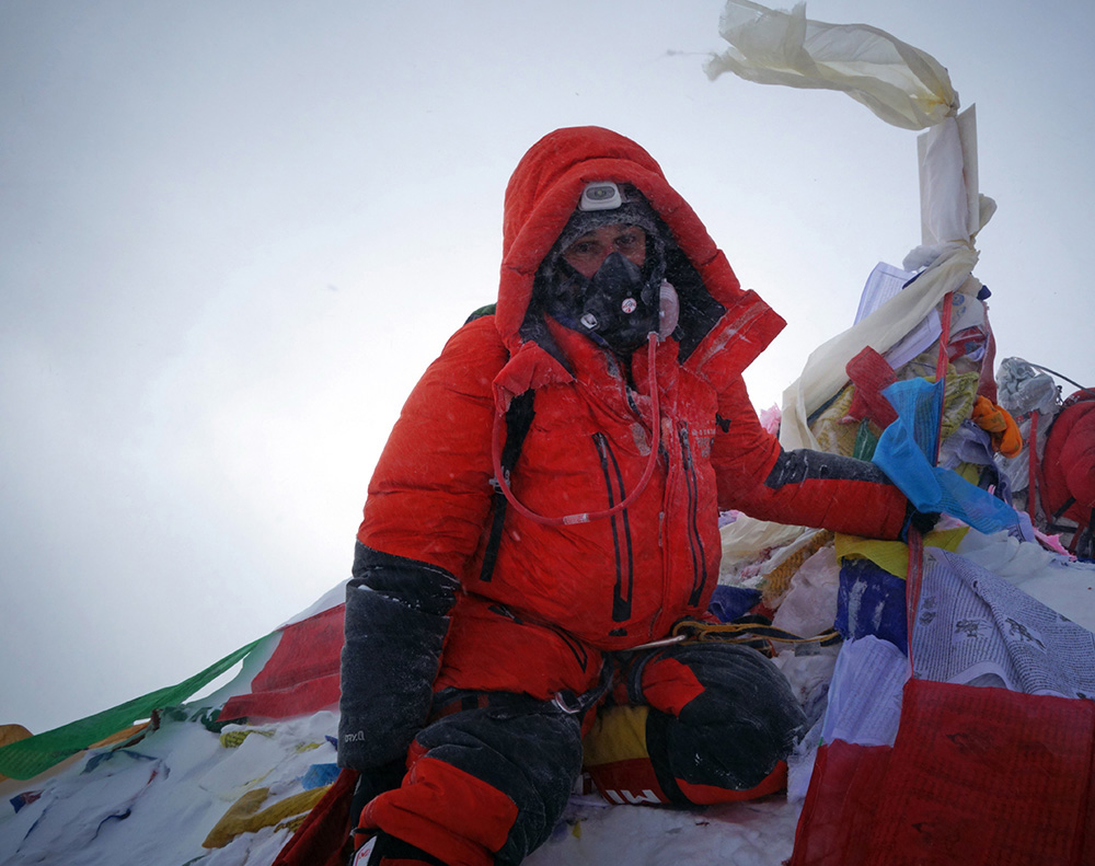 George Kashouh on the summit of Mount Everest