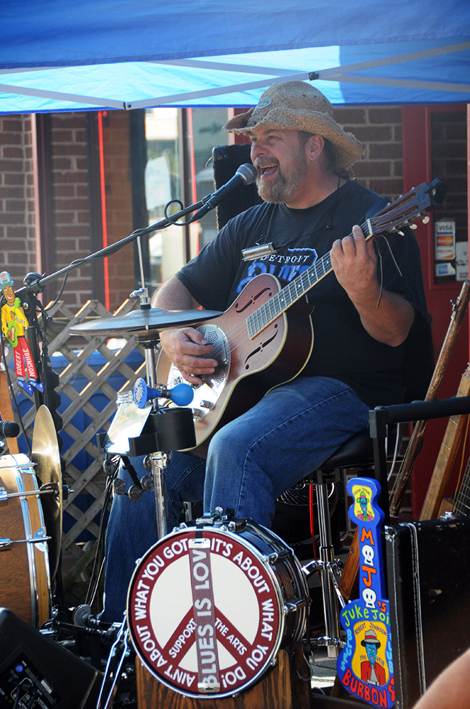 Street musician performing near Eastern Market in Detroit