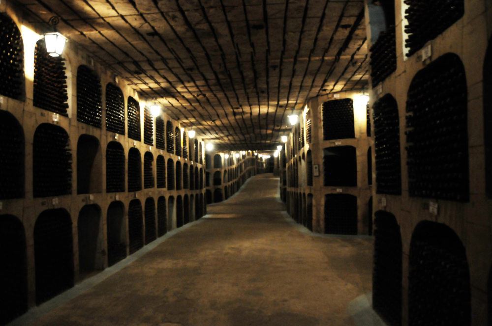 Wine bottles stored in the underground cellars of Milestii Mici