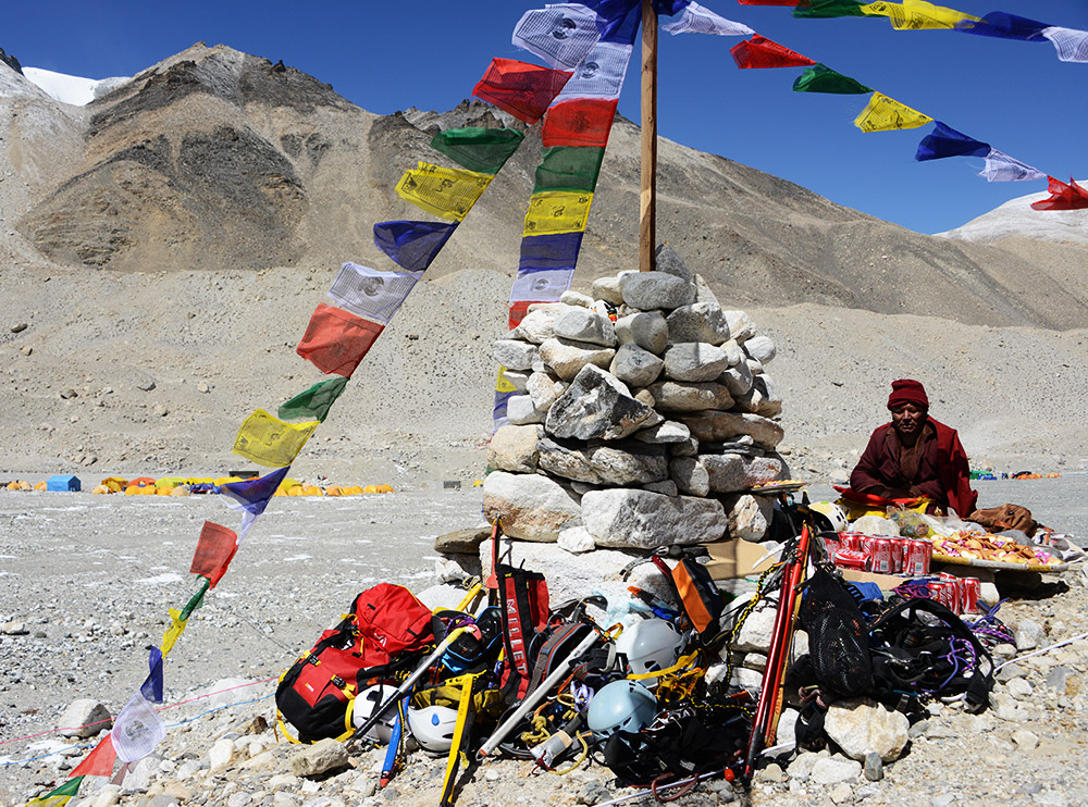 Buddhist monk performing a puja ceremony at Everest Base Camp