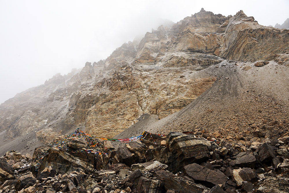 Prayer flags and mountains behind Rongbuk Monastery