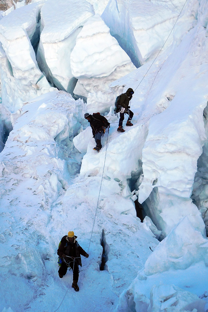 Climbers descending through the Khumbu Icefall