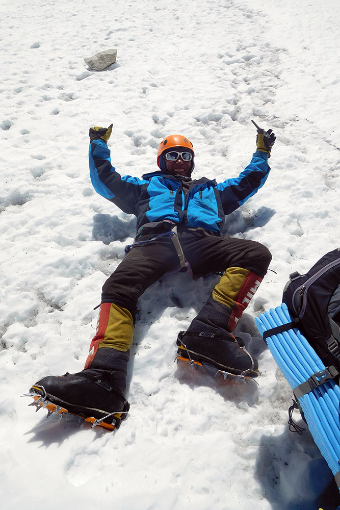 Sherpa celebrating a safe descent from the Lhotse Face