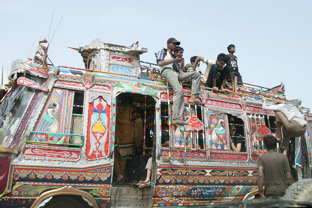 Decorated bus traveling through Karachi, Pakistan