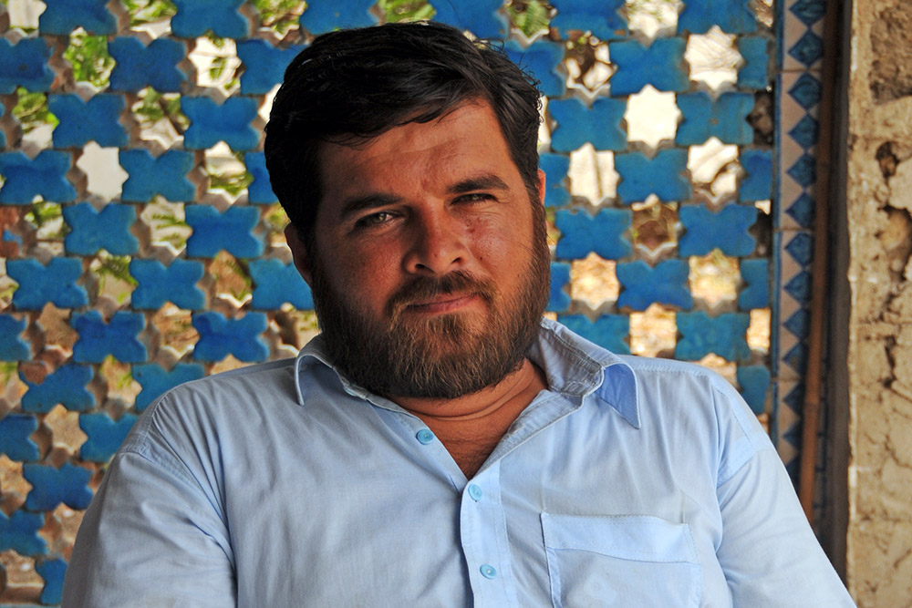 Man at the entrance to the National Museum in Karachi, Pakistan