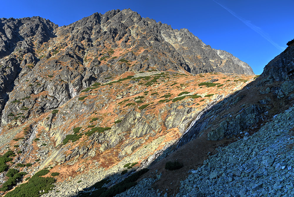 Waterfall and mountain shadows in Slovakia's High Tatras