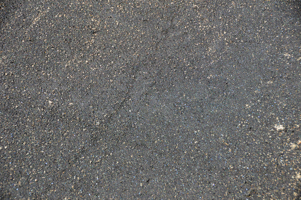 Black sand mixed with lighter sand along the coast near Berbera