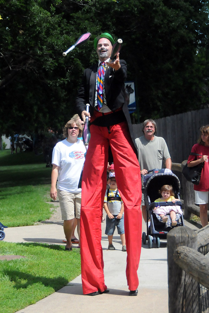 Performer on stilts at the Great Plains Zoo