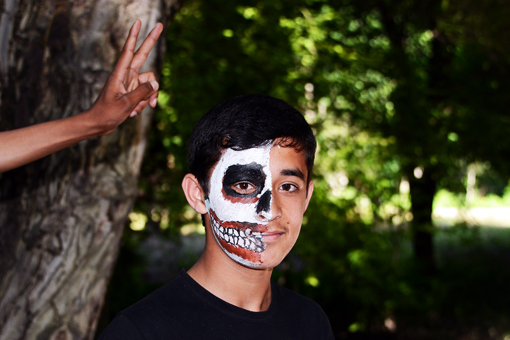 Face Paint Child with face paint in a Dushanbe park
