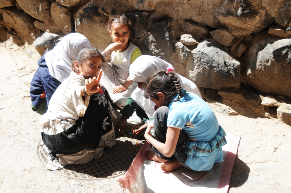 Children playing a street game in Ibb Yemen