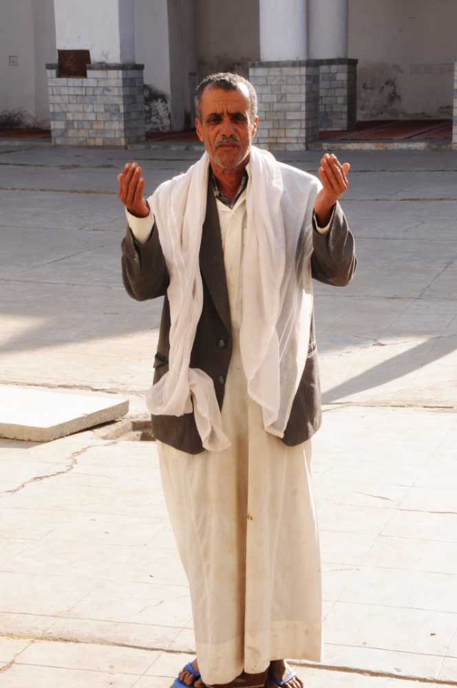 Prayer inside a mosque in Jiblah Yemen
