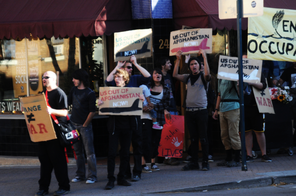 Anti-war protesters demonstrating in downtown Flagstaff, Arizona