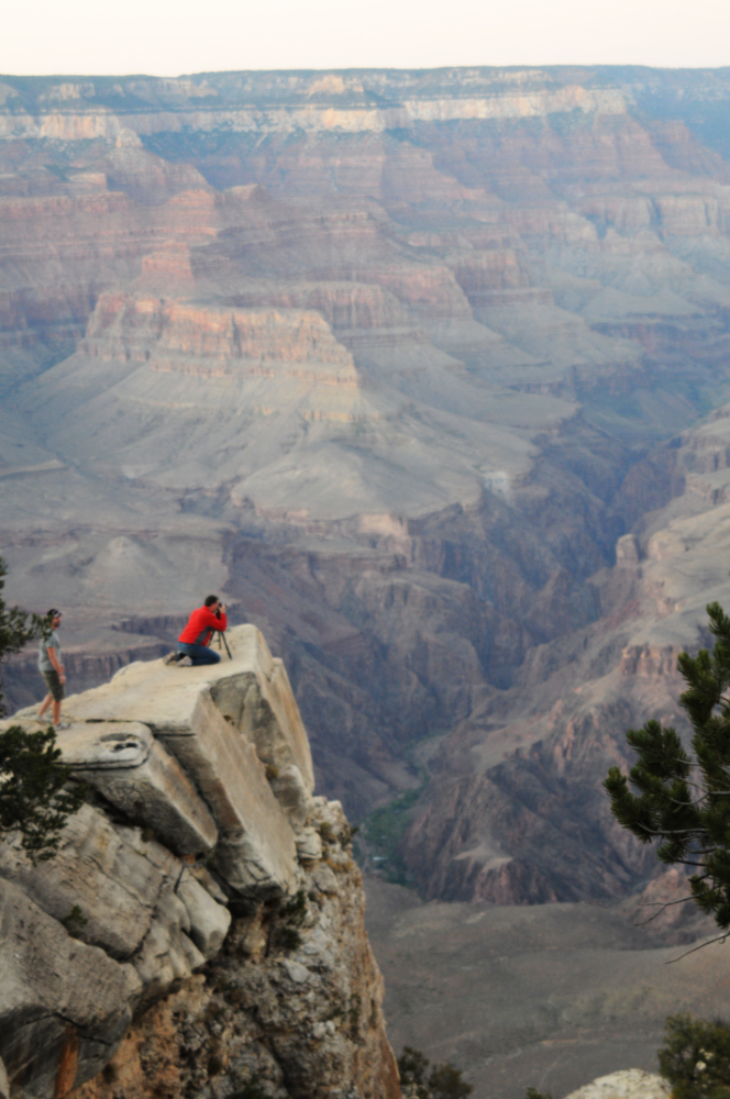 Photographer at a Grand Canyon viewpoint in Arizona