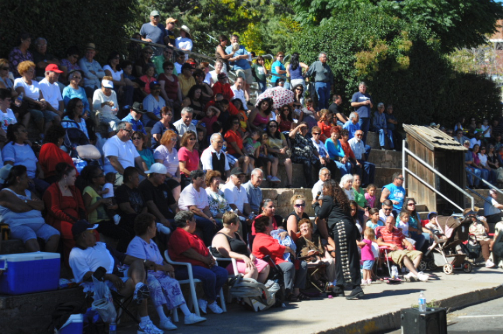 Visitors gathered outdoors in the historic mining town of Jerome, Arizona
