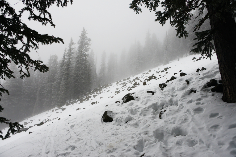 Snow-covered rockslide crossing on the winter route up Humphreys Peak